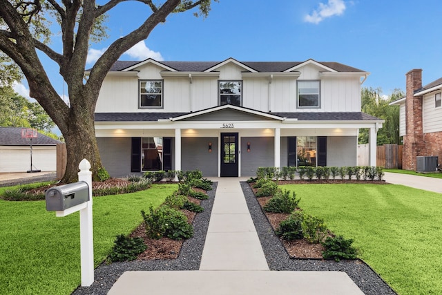 5623 Oak Trail Ln, Houston, TX 77091 - view of front of home featuring board and batten siding and a porch