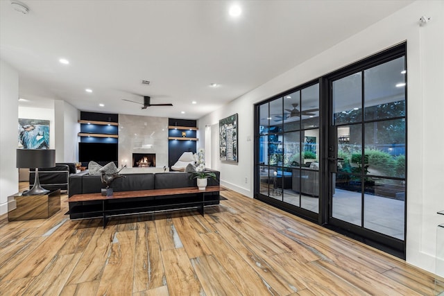 5623 Oak Trail Ln, Houston, TX 77091 - living room with wood finished floors, ceiling fan, and recessed lighting