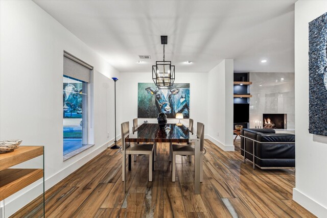 5623 Oak Trail Ln, Houston, TX 77091 - dining space with wood finished floors and a chandelier