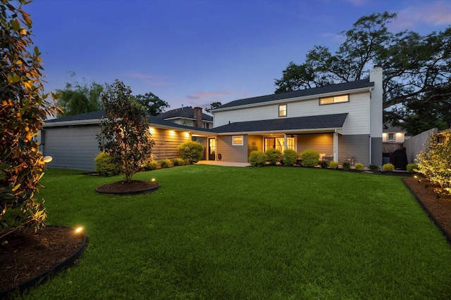 5623 Oak Trail Ln, Houston, TX 77091 - view of front of house with a chimney and a patio
