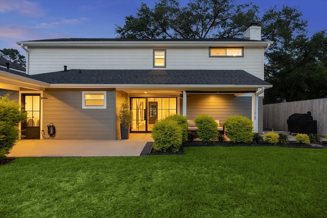5623 Oak Trail Ln, Houston, TX 77091 - rear view of house featuring a chimney and a patio area
