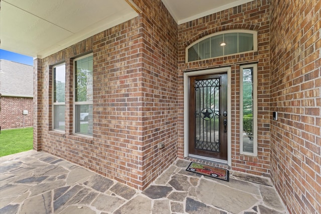 130 S Sawbridge Cir, Spring, TX 77389 - view of exterior entry featuring brick siding