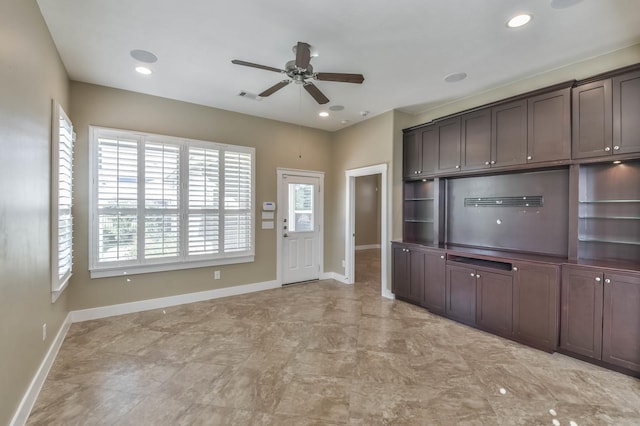 16803 Amelia Island Dr, Cypress, TX 77433 - unfurnished living room with ceiling fan and recessed lighting