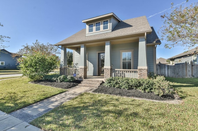 16803 Amelia Island Dr, Cypress, TX 77433 - view of front of house featuring covered porch, a shingled roof, and brick siding