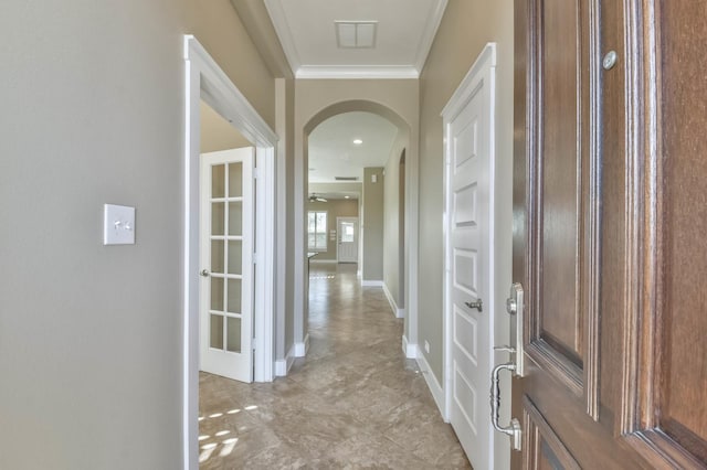 16803 Amelia Island Dr, Cypress, TX 77433 - hall with arched walkways and ornamental molding