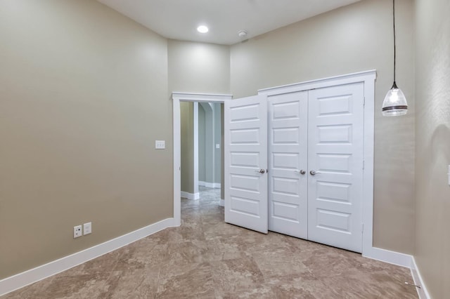 16803 Amelia Island Dr, Cypress, TX 77433 - unfurnished bedroom featuring baseboards and a closet