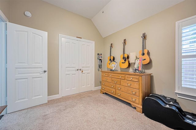 9427 Fern Wood Frst, Houston, TX 77040 - carpeted bedroom with vaulted ceiling and a closet