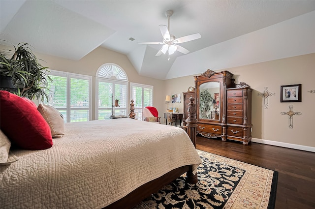 9427 Fern Wood Frst, Houston, TX 77040 - bedroom featuring dark wood-style flooring, vaulted ceiling, and ceiling fan