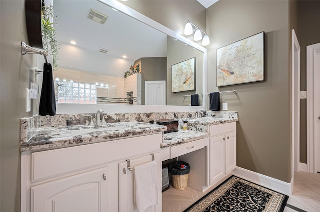 9427 Fern Wood Frst, Houston, TX 77040 - bathroom featuring double vanity and tiled shower