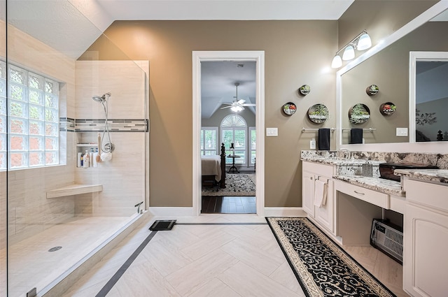9427 Fern Wood Frst, Houston, TX 77040 - bathroom featuring connected bathroom, vaulted ceiling, vanity, and walk in shower