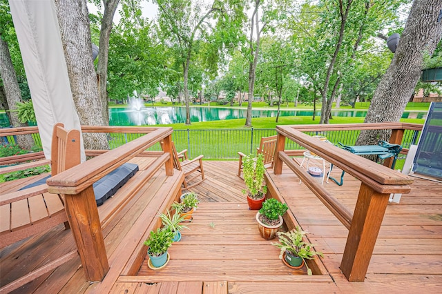9427 Fern Wood Frst, Houston, TX 77040 - wooden terrace featuring a water view and a lawn
