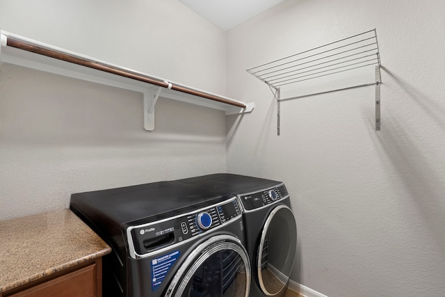 9707 Old Timber Ln, Spring, TX 77379 - laundry room featuring independent washer and dryer