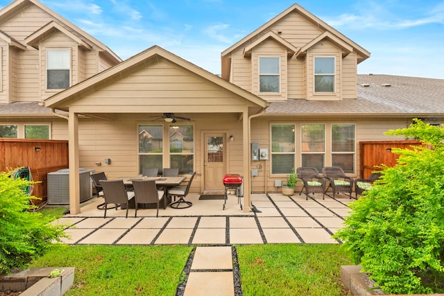 9707 Old Timber Ln, Spring, TX 77379 - rear view of house with a ceiling fan, a patio, and a shingled roof