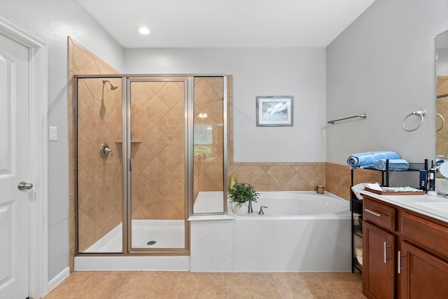 9707 Old Timber Ln, Spring, TX 77379 - bathroom with vanity, a bath, tile patterned flooring, and a shower stall
