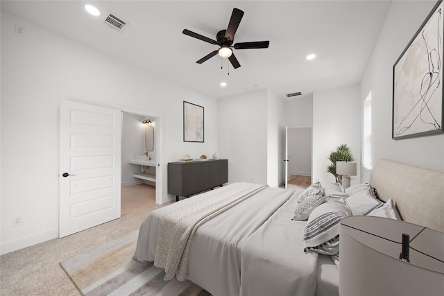2012 Chew St, Houston, TX 77020 - bedroom with recessed lighting, light colored carpet, ensuite bath, and a ceiling fan