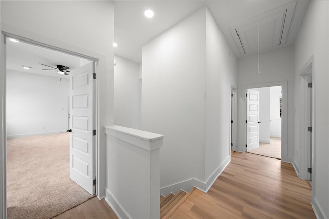 2012 Chew St, Houston, TX 77020 - hall featuring attic access, an upstairs landing, light wood-type flooring, and recessed lighting
