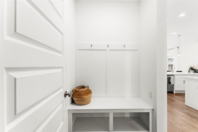 7202 Cordgrass Prairie Ln, Katy, TX 77493 - mudroom featuring light wood-style flooring and recessed lighting