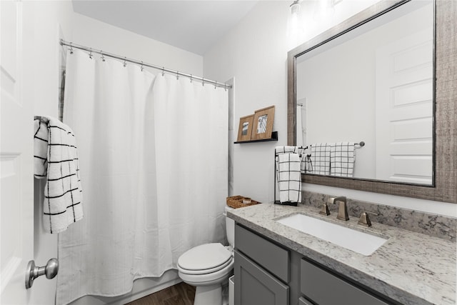 7202 Cordgrass Prairie Ln, Katy, TX 77493 - full bathroom featuring vanity, wood finished floors, and shower / bathtub combination with curtain