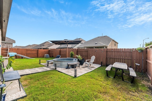 7202 Cordgrass Prairie Ln, Katy, TX 77493 - fenced backyard featuring a patio area