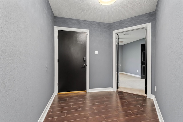 6510 Barrygate Dr, Spring, TX 77373 - entrance foyer with wood finish floors, a textured wall, and a textured ceiling