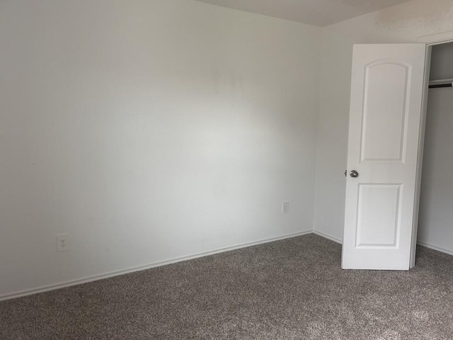14217 Dream Rd, New Caney, TX 77357 - unfurnished bedroom with carpet flooring and baseboards
