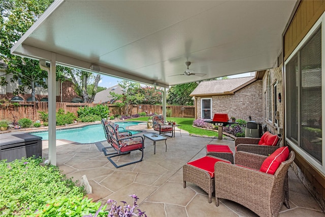 2218 Lashley Ct, Katy, TX 77450 - fenced backyard featuring a patio and ceiling fan