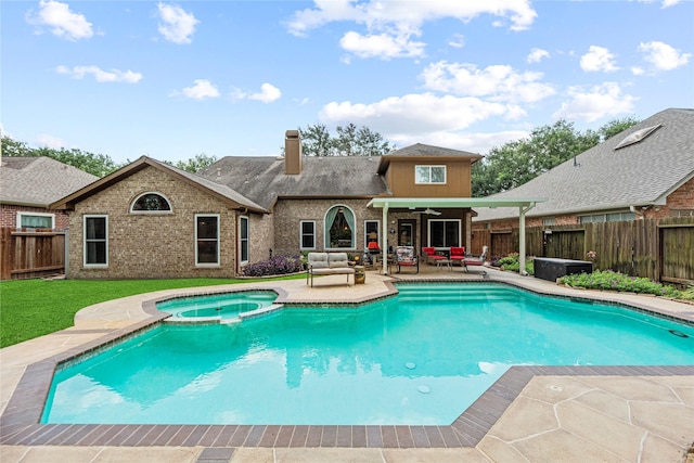 2218 Lashley Ct, Katy, TX 77450 - view of pool with a fenced backyard, a ceiling fan, a pool with connected hot tub, and a patio