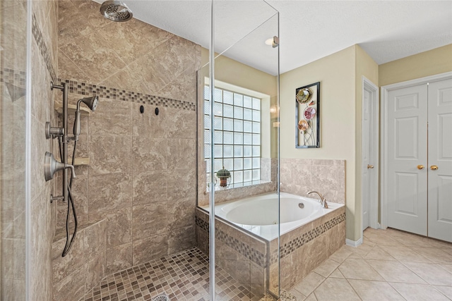 2218 Lashley Ct, Katy, TX 77450 - bathroom with a garden tub, a stall shower, and tile patterned floors