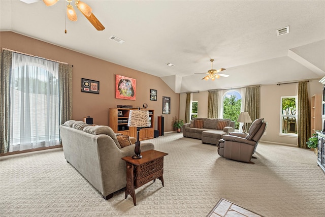 2218 Lashley Ct, Katy, TX 77450 - living area with a ceiling fan, lofted ceiling, and light colored carpet