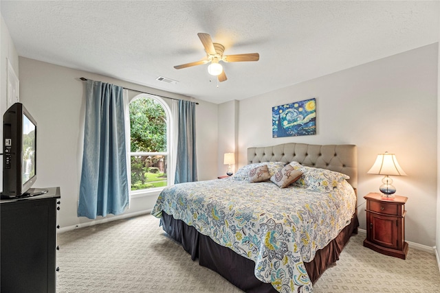 2218 Lashley Ct, Katy, TX 77450 - bedroom featuring light colored carpet, a ceiling fan, and a textured ceiling