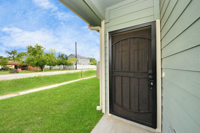 9805 Kerr, Houston, TX 77029 - property entrance with a lawn