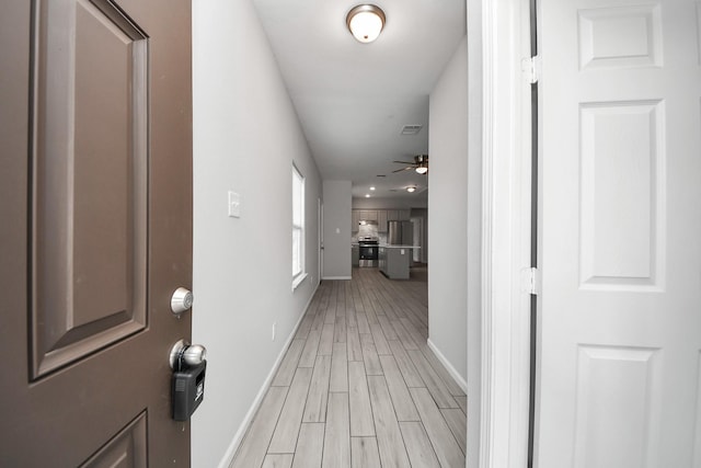 9805 Kerr, Houston, TX 77029 - hallway featuring light wood-style floors and recessed lighting