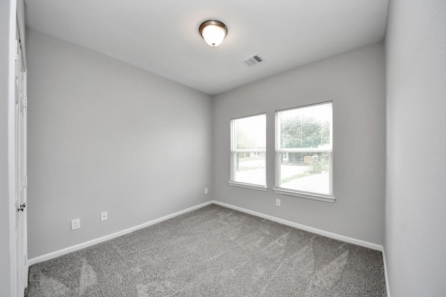 9805 Kerr, Houston, TX 77029 - carpeted empty room with baseboards