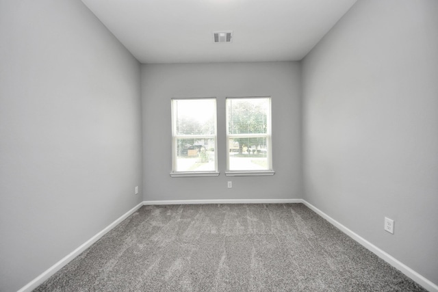 9805 Kerr, Houston, TX 77029 - empty room featuring carpet and baseboards
