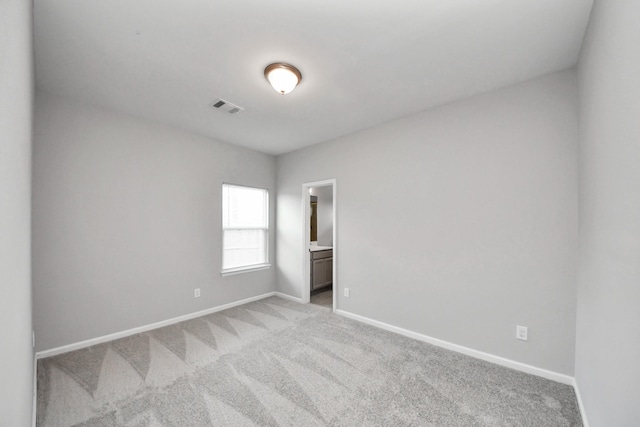 9805 Kerr, Houston, TX 77029 - empty room with carpet floors and baseboards