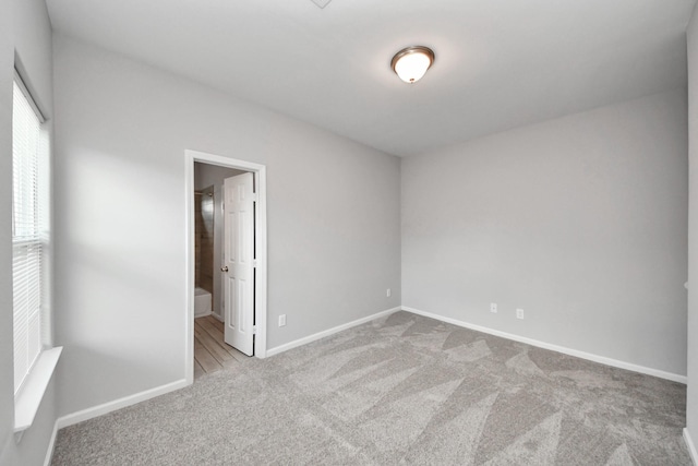 9805 Kerr, Houston, TX 77029 - unfurnished bedroom with carpet flooring and baseboards