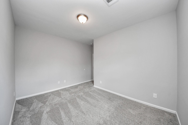 9805 Kerr, Houston, TX 77029 - empty room with carpet flooring and baseboards