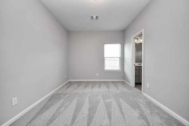 9805 Kerr, Houston, TX 77029 - spare room with carpet flooring and baseboards