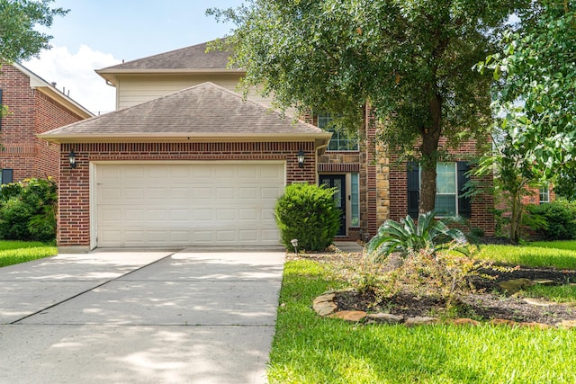 3618 Avalon Spring Ln, Spring, TX 77386 - traditional home featuring a shingled roof, driveway, an attached garage, and brick siding