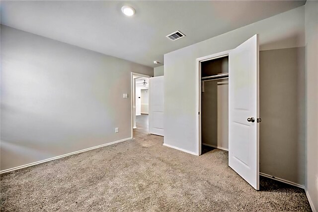 22835 Berthoud Trl, Spring, TX 77373 - unfurnished bedroom featuring carpet floors and a closet