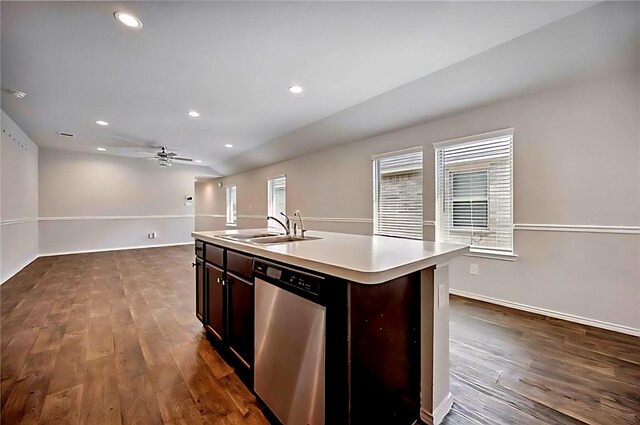 22835 Berthoud Trl, Spring, TX 77373 - kitchen with dishwasher, light countertops, dark wood-style flooring, a center island with sink, and recessed lighting