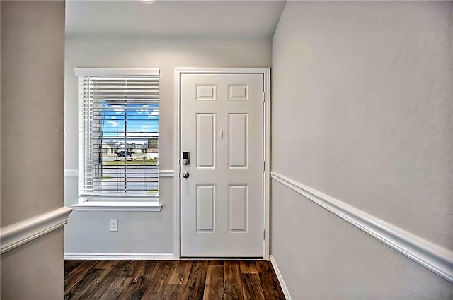 22835 Berthoud Trl, Spring, TX 77373 - foyer entrance featuring dark wood-style flooring and baseboards