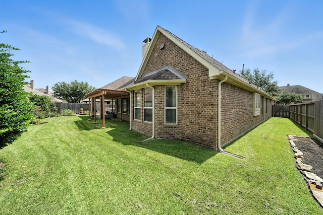 4118 Sage Brush Ct, Manvel, TX 77578 - rear view of property featuring brick siding, a fenced backyard, and a chimney