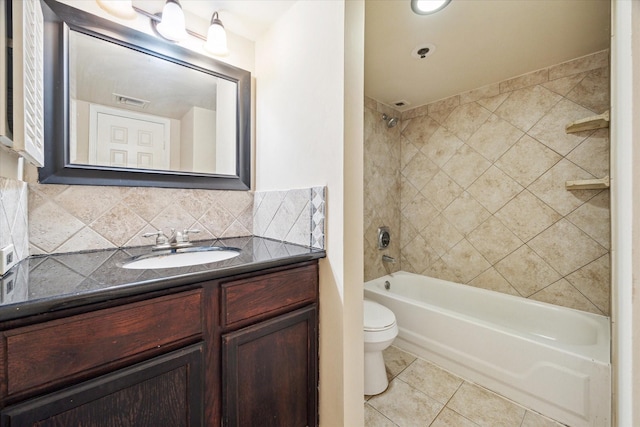 3525 Sage Rd Unit 805, Houston, TX 77056 - bathroom featuring vanity, shower / washtub combination, backsplash, and tile patterned floors