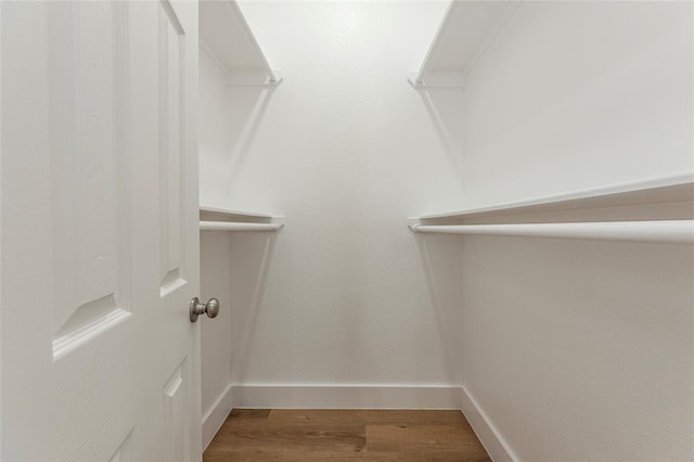 9727 Cargill St Unit A, Houston, TX 77029 - spacious closet with wood finished floors