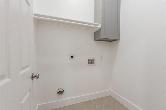 9727 Cargill St Unit A, Houston, TX 77029 - laundry room featuring hookup for an electric dryer, washer hookup, and light tile patterned floors