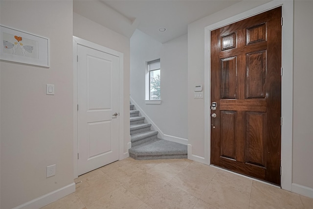 9027 Laverne Cres, Houston, TX 77080 - foyer featuring stairway and light tile patterned flooring