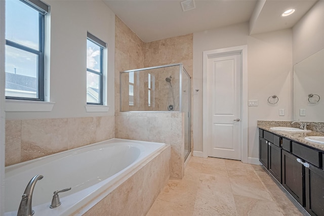 9027 Laverne Cres, Houston, TX 77080 - bathroom featuring a bath, a stall shower, and double vanity