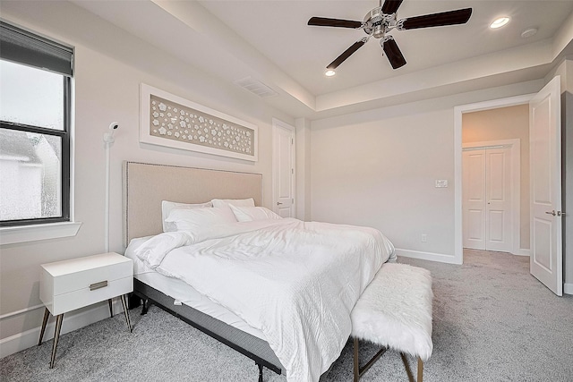 9027 Laverne Cres, Houston, TX 77080 - carpeted bedroom with recessed lighting, a ceiling fan, and a raised ceiling