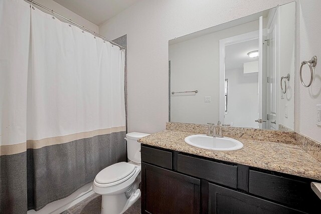 9027 Laverne Cres, Houston, TX 77080 - bathroom featuring vanity and curtained shower